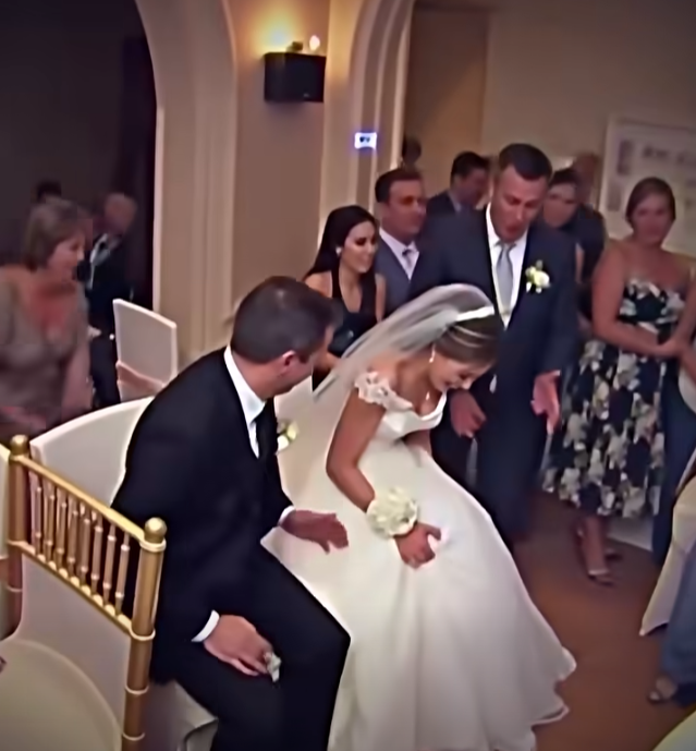 At the wedding, something started moving under the bride’s dress! …